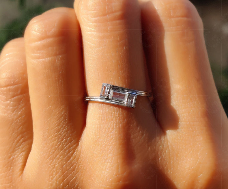 Elegance in Every Detail: Three Baguette Moissanite Ring in Minimalist Gold - A Swirl Bypass Style Ring That Exudes Uniqueness and Sophistication for Women's Wedding Rings