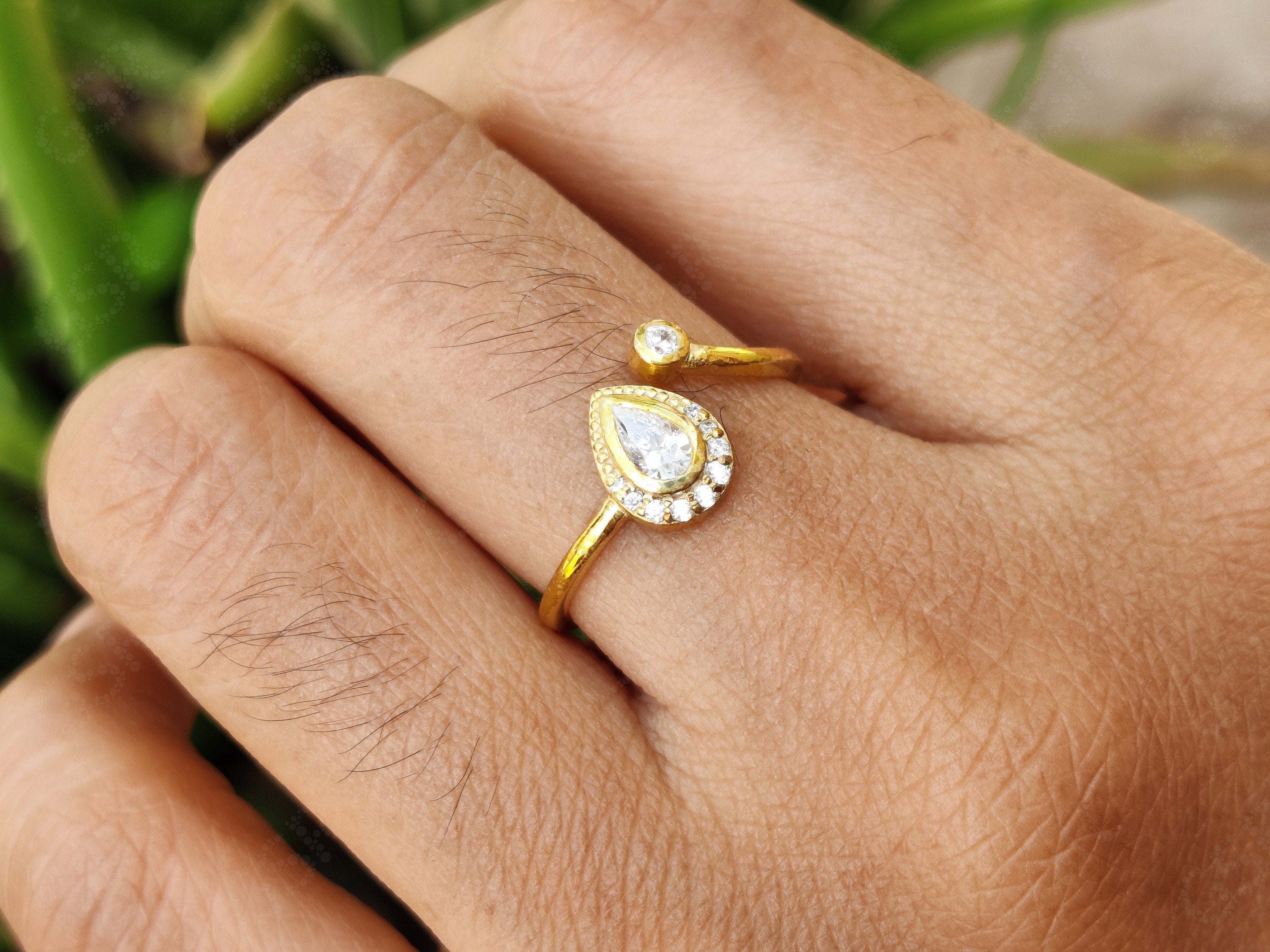 Chic Open Cuff Moissanite Ring – A Pear-Shaped Halo in Silver and Gold