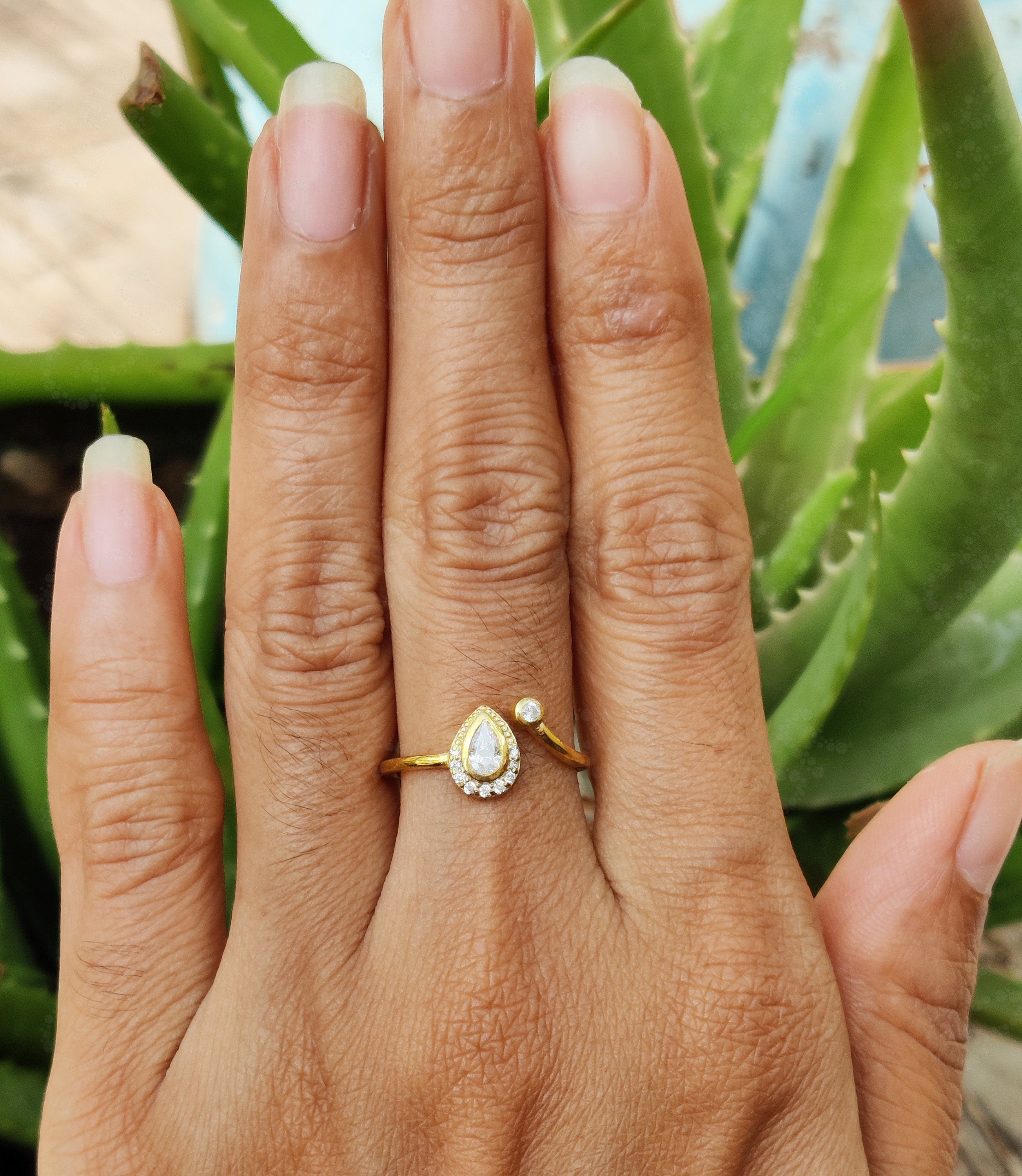 Chic Open Cuff Moissanite Ring – A Pear-Shaped Halo in Silver and Gold - Gelson World - Premium Silver and Gold Jewelry for USA Shoppers