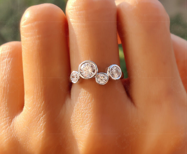 Captivating Bubbles: Four Stone Moissanite Cluster Ring, a Dazzling Anniversary Statement in Gold