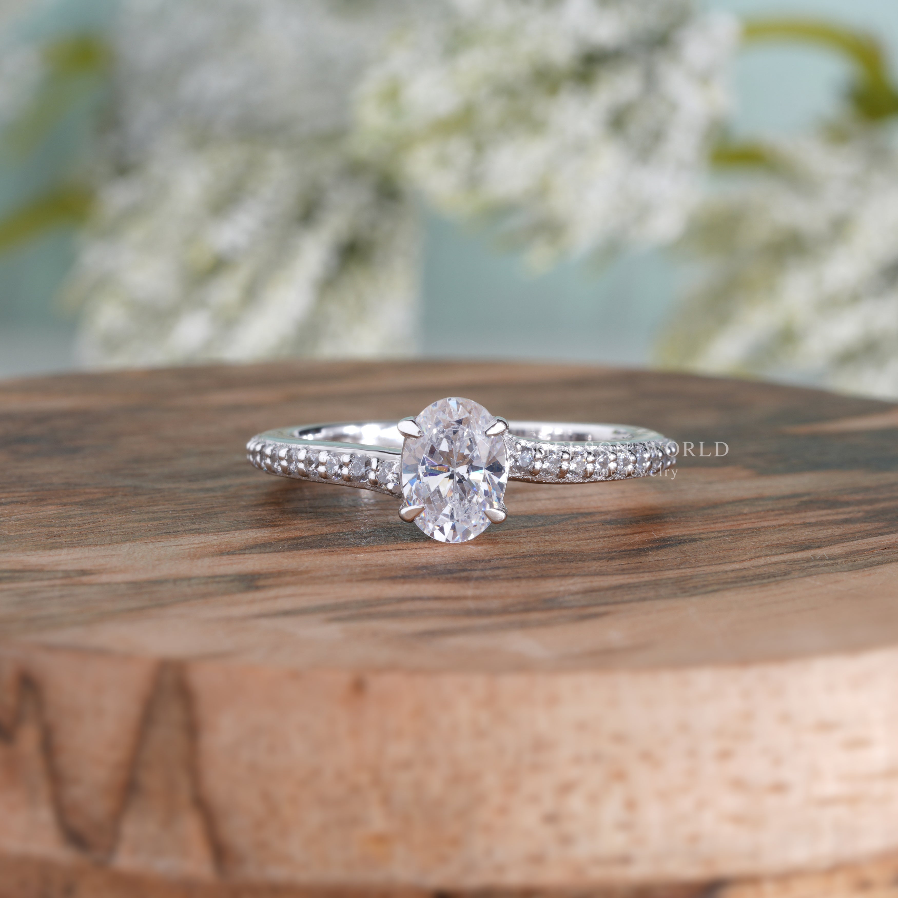 0.70Ct Oval Moissanite Solitaire Engagement Ring With Side Stones