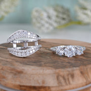 Ring Jacket and Round 3 Stone Engagement Ring
