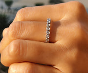 Timeless Brilliance: 2mm Round Bezel Moissanite Wedding Band in Silver and Gold - A Stunning Half Eternity Stacking Ring