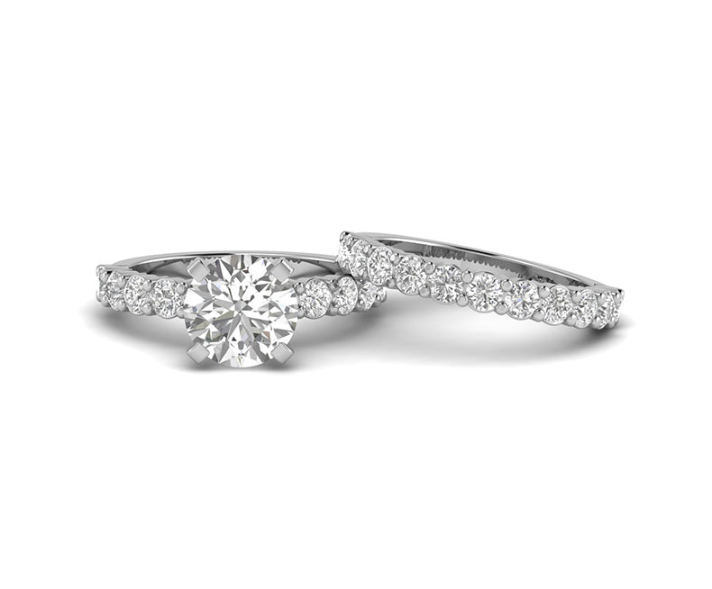 Shop solitaire engagement ring with matching wedding band, featuring timeless elegance and brilliant sparkle, perfect for proposals and weddings.