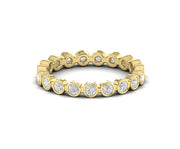 Radiate Elegance with a 2.20 mm Round Bezel Moissanite Women's Wedding Band – Available in Silver and Gold. Elevate Your Style with a Full Eternity Brilliant Cut Moissanite Ring, Ideal for Stacking