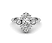 Oval Moissanite Starburst Halo Engagement Ring