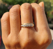 Elegant Brilliance: Graduated Round Moissanite Anniversary Ring in Silver and Gold