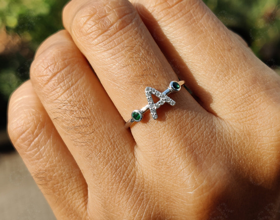 Cherish Moments with a Personalized Initial Birthstone Ring – Perfect for Mom and Women. Admire the Beauty of a Silver and Gold Dainty Gemstone Ring with an Adjustable Letter Design