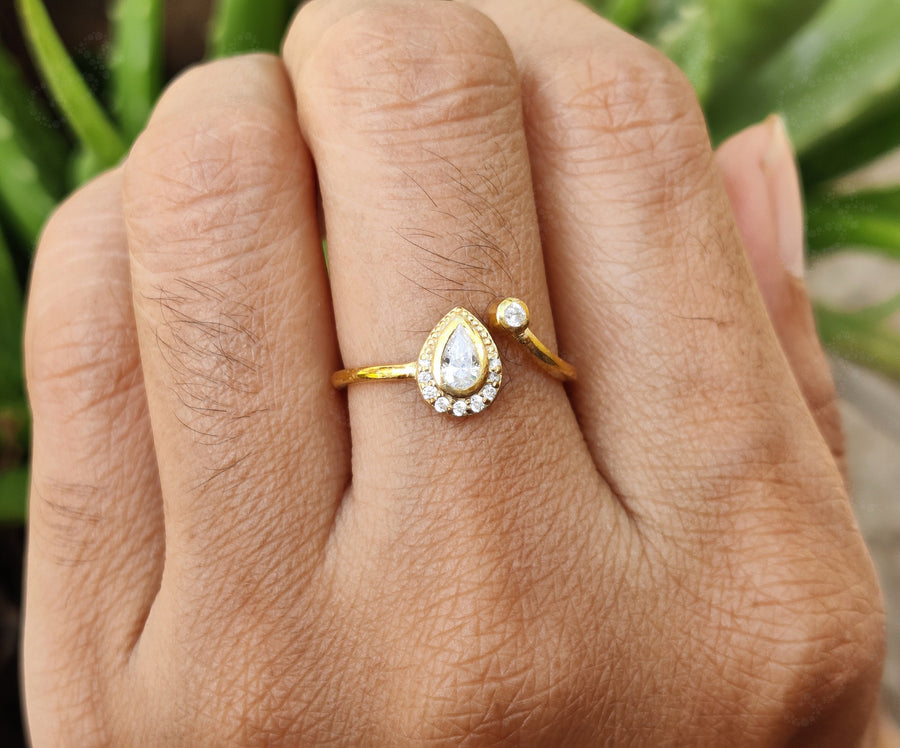 Chic Open Cuff Moissanite Ring – A Pear-Shaped Halo in Silver and Gold
