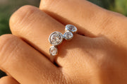Captivating Bubbles: Four Stone Moissanite Cluster Ring, a Dazzling Anniversary Statement in Gold