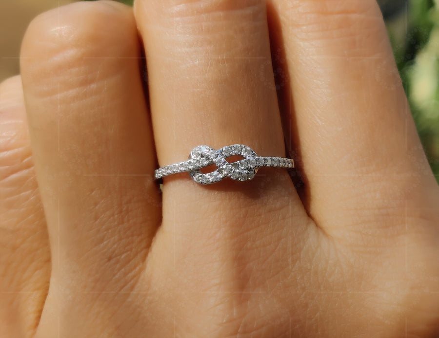 Infinite Love: Tie The Knot Stackable Ring, a Promise of Eternity and Friendship in Silver and Gold