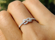 Infinite Love: Tie The Knot Stackable Ring, a Promise of Eternity and Friendship in Silver and Gold